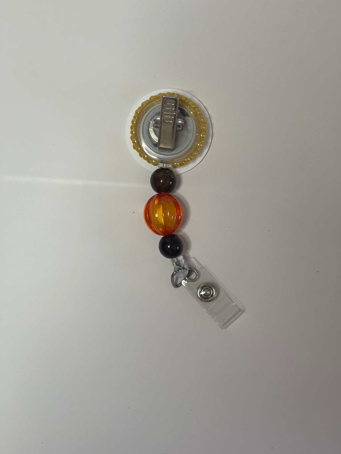 Lion Badge Reel with Beads