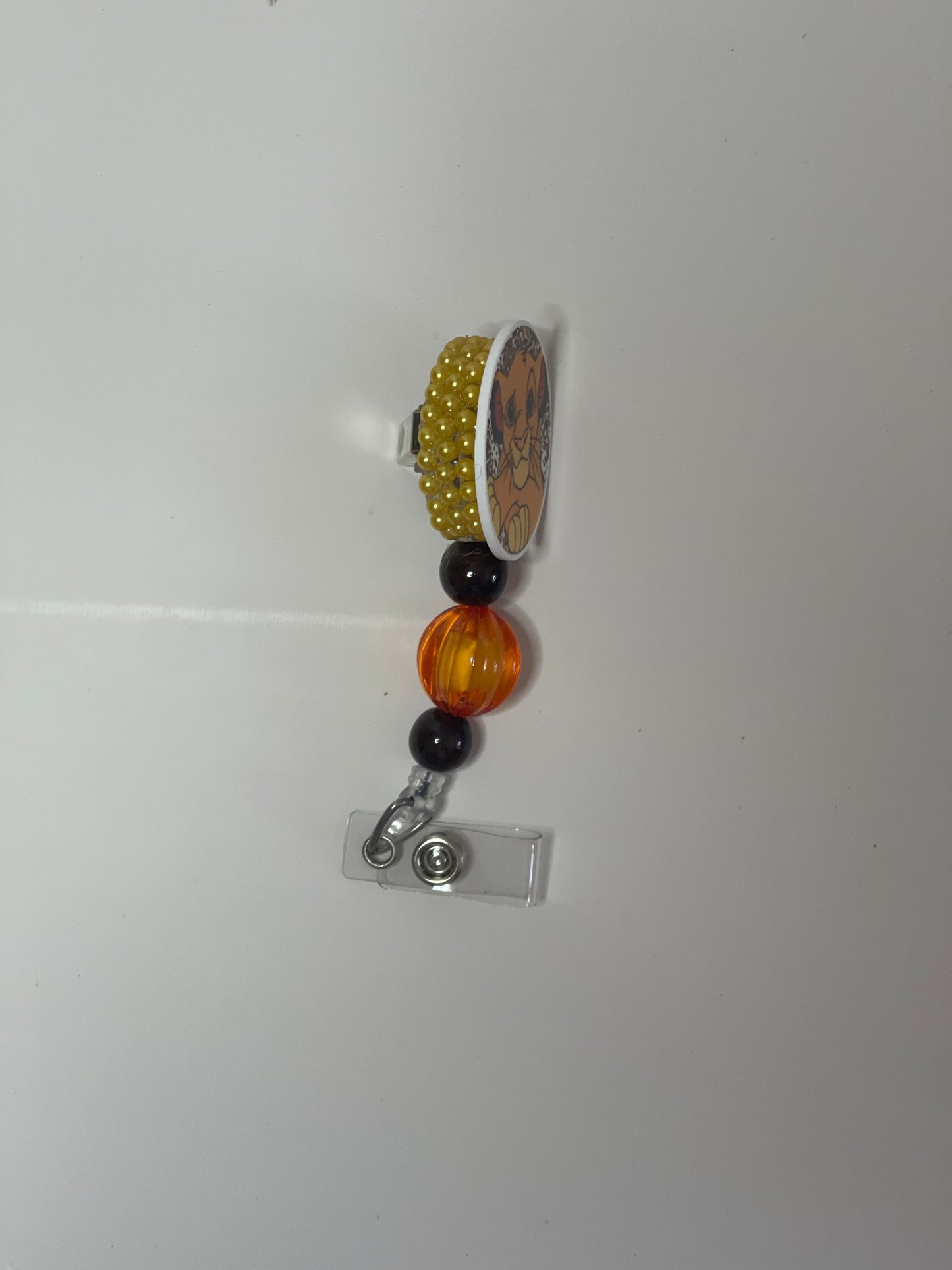 Lion Badge Reel with Beads