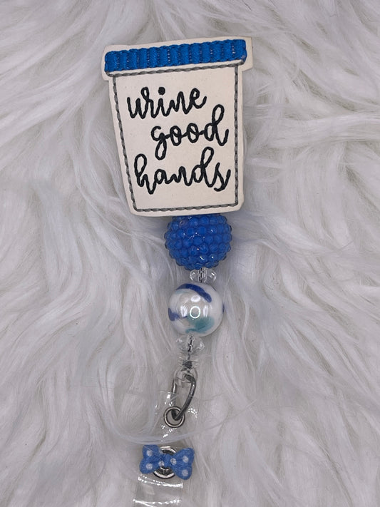 Urine Good Hands Badge Reel